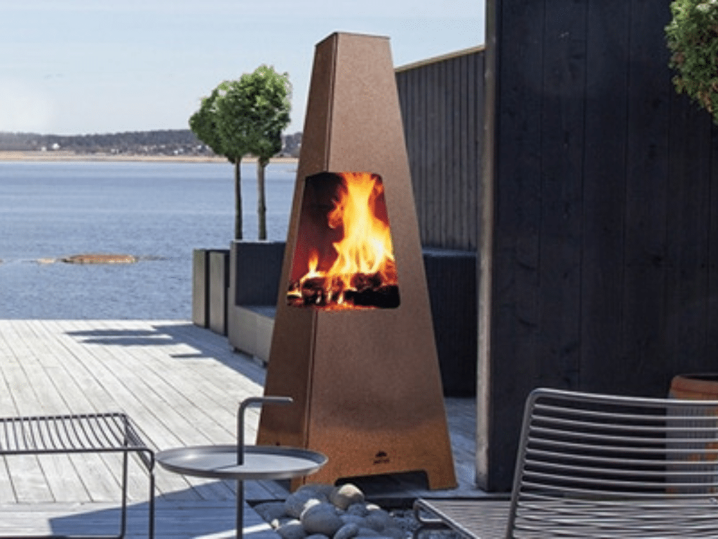 Building an Outdoor Fireplace in Simcoe? How to Choose Between Rustic and Modern Design
